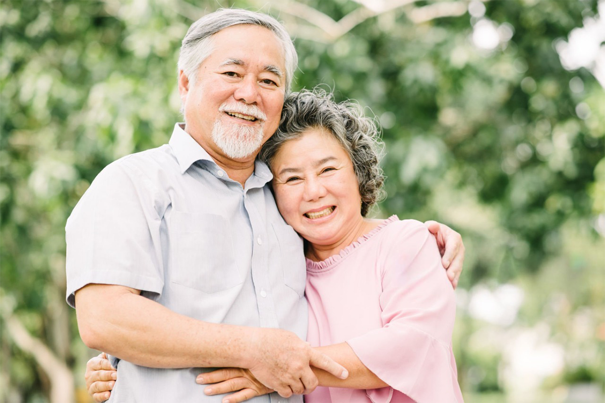 Smiling senior Malaysian couple